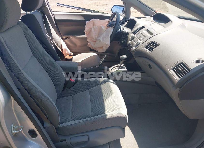 Photo 5 of 2011 Honda Civic LX (VIN 19XFA1F52BE038856)