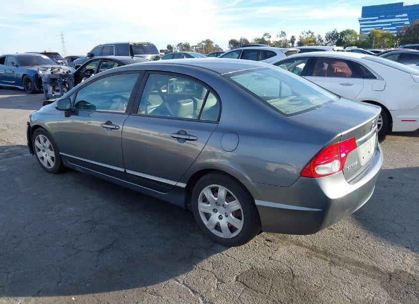 Photo 3 of 2011 Honda Civic LX (VIN 19XFA1F52BE049825)