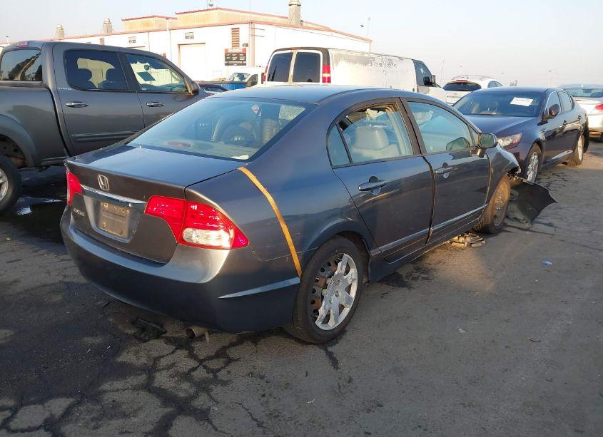 Photo 4 of 2011 Honda Civic LX (VIN 19XFA1F52BE049825)