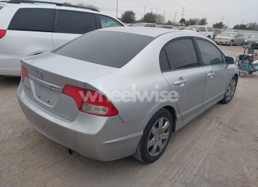 Photo 4 of 2010 Honda Civic LX (VIN 19XFA1F53AE057916)