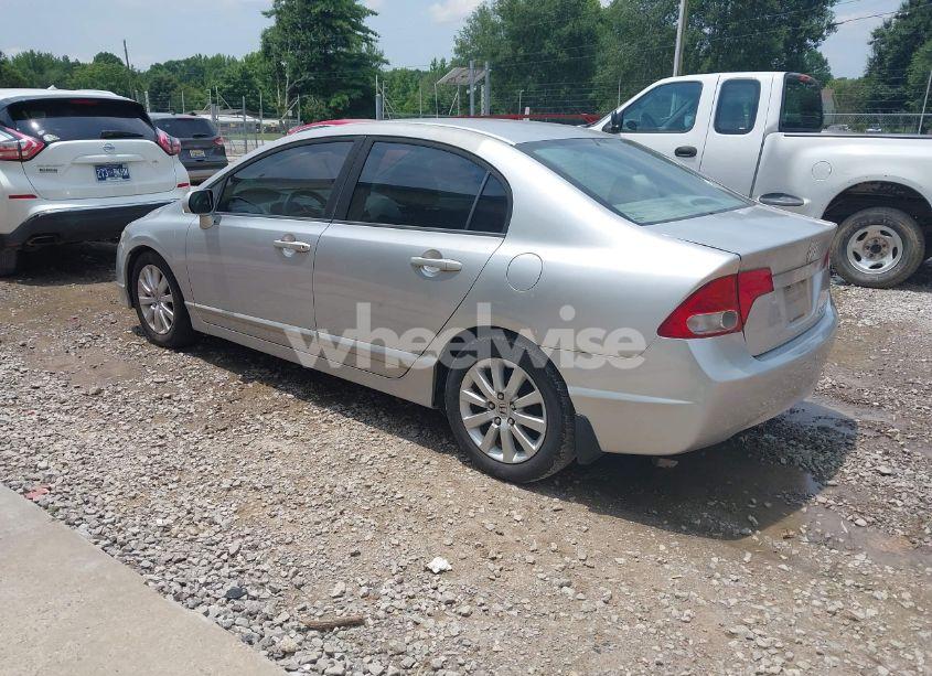 Photo 3 of 2011 Honda Civic LX (VIN 19XFA1F53BE016588)