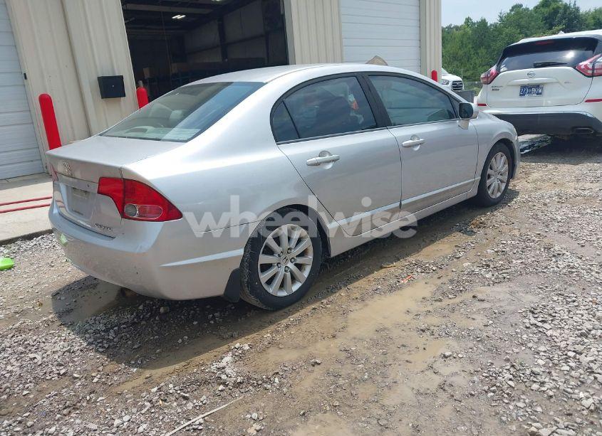 Photo 4 of 2011 Honda Civic LX (VIN 19XFA1F53BE016588)