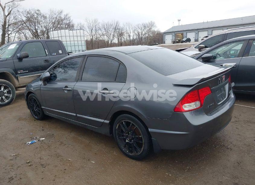 Photo 3 of 2011 Honda Civic LX (VIN 19XFA1F53BE018907)