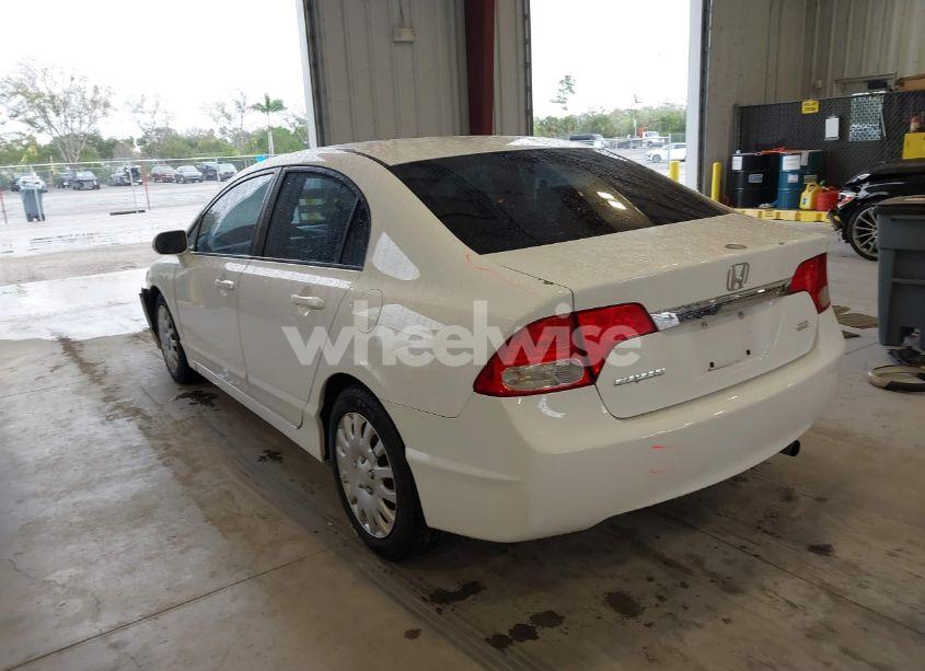 Photo 12 of 2011 Honda Civic LX (VIN 19XFA1F53BE033455)