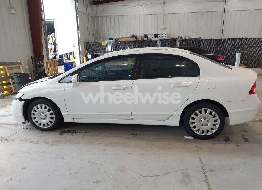 Photo 15 of 2011 Honda Civic LX (VIN 19XFA1F53BE033455)