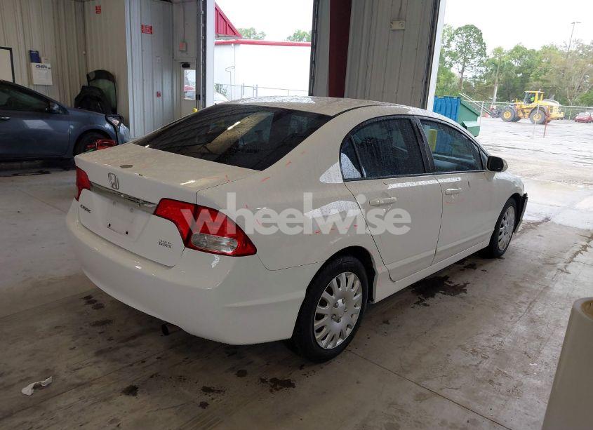 Photo 4 of 2011 Honda Civic LX (VIN 19XFA1F53BE033455)