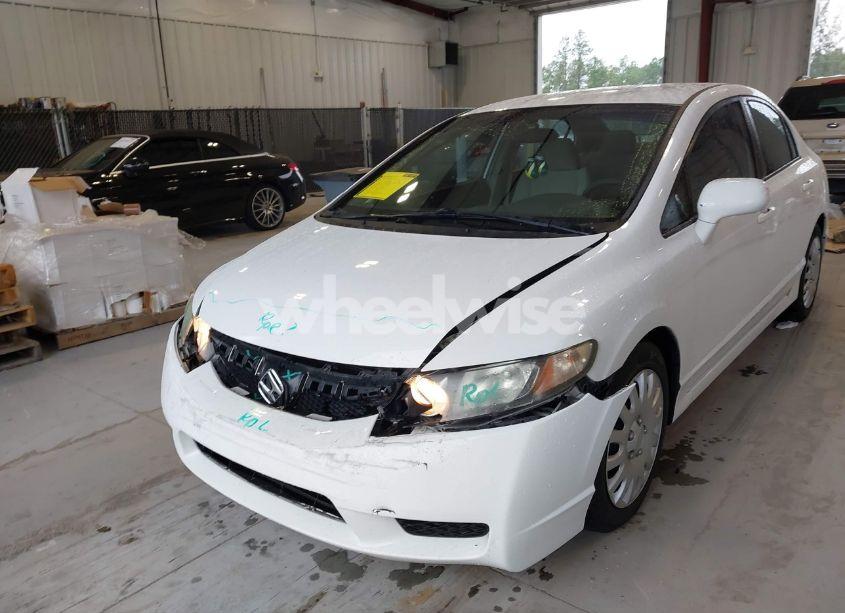 Photo 6 of 2011 Honda Civic LX (VIN 19XFA1F53BE033455)
