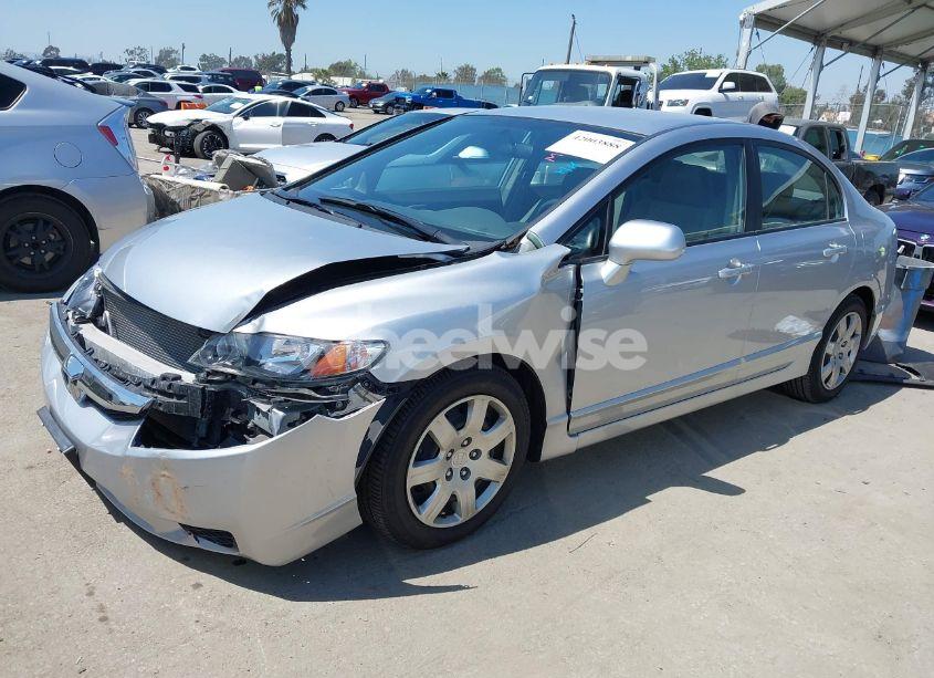Photo 2 of 2010 Honda Civic LX (VIN 19XFA1F54AE031082)
