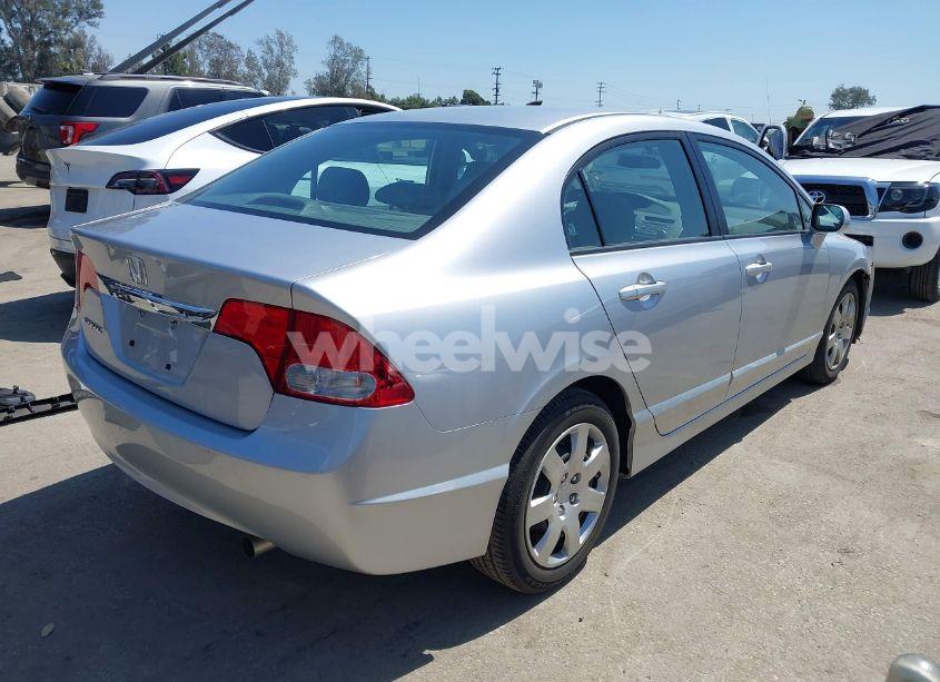 Photo 4 of 2010 Honda Civic LX (VIN 19XFA1F54AE031082)