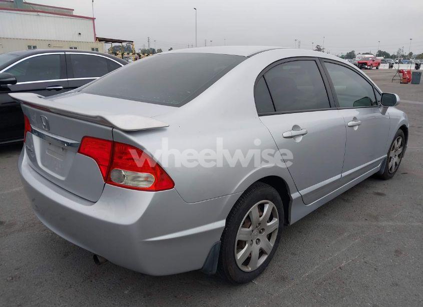 Photo 4 of 2010 Honda Civic LX (VIN 19XFA1F54AE048495)