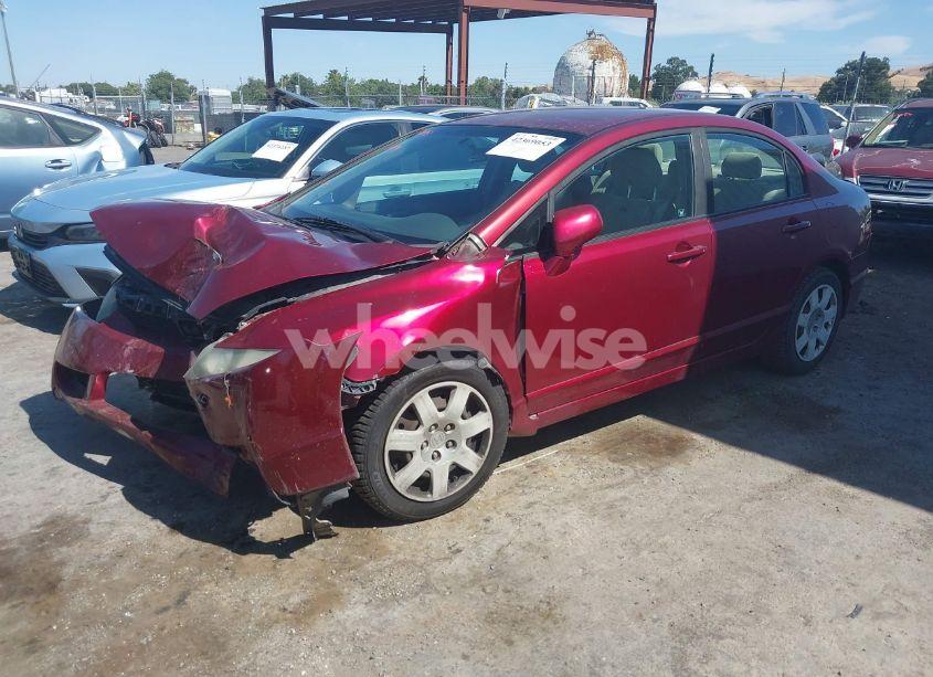 Photo 2 of 2010 Honda Civic LX (VIN 19XFA1F54AE057116)