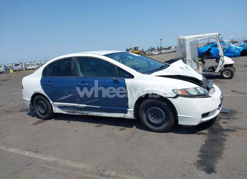 Photo 12 of 2010 Honda Civic LX (VIN 19XFA1F54AE074725)