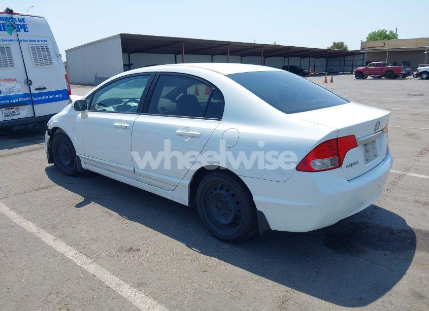 Photo 3 of 2010 Honda Civic LX (VIN 19XFA1F54AE074725)