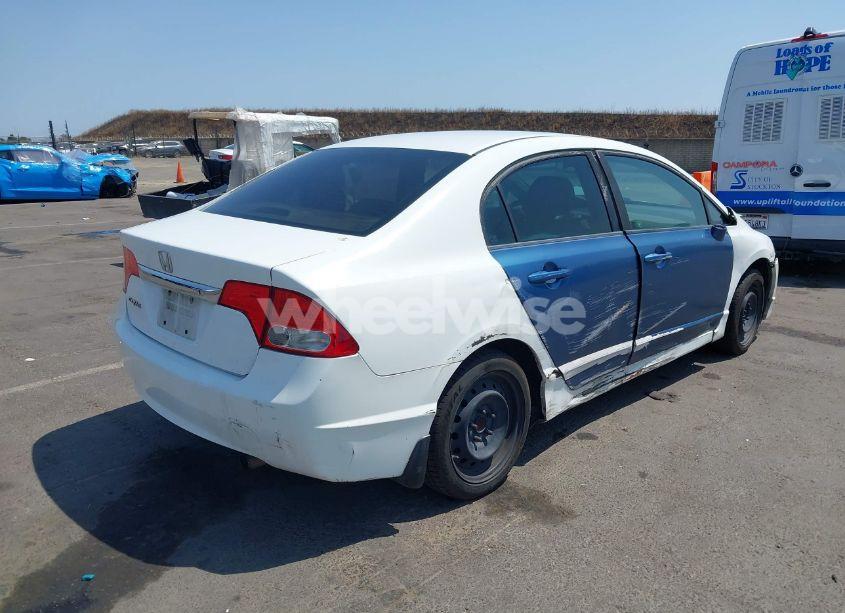 Photo 4 of 2010 Honda Civic LX (VIN 19XFA1F54AE074725)