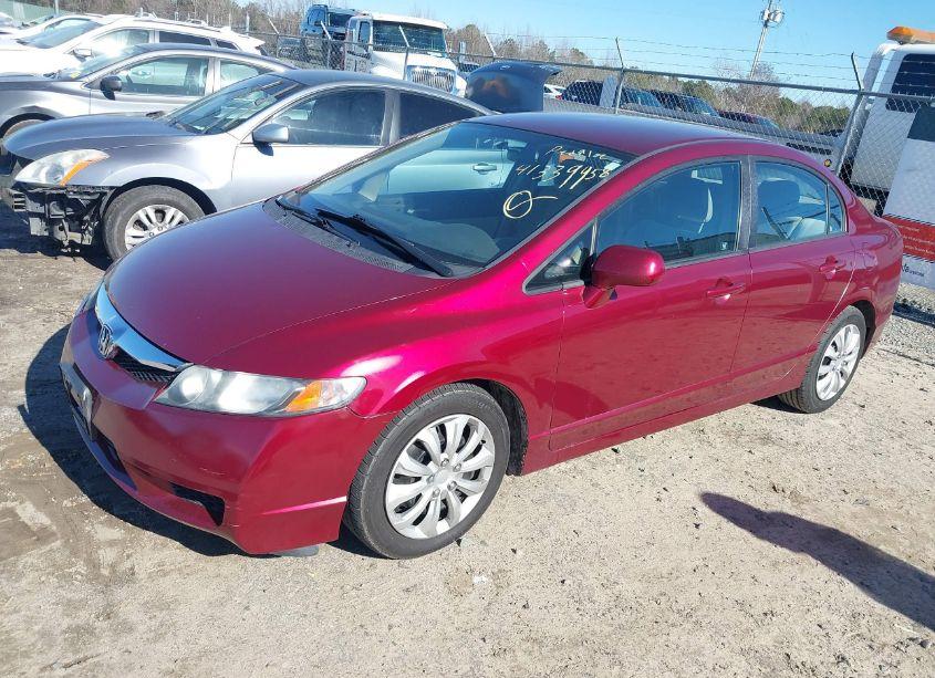 Photo 2 of 2011 Honda Civic LX (VIN 19XFA1F54BE021539)