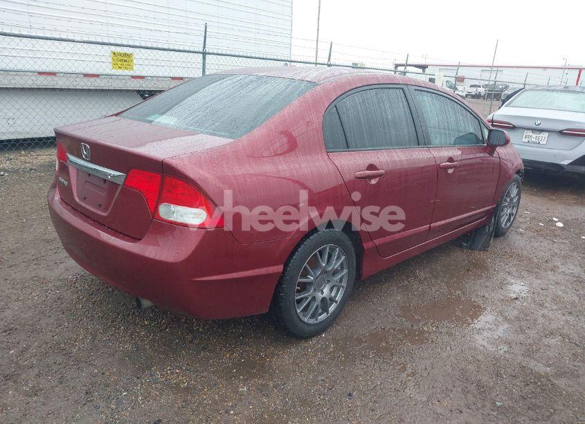 Photo 4 of 2011 Honda Civic LX (VIN 19XFA1F55BE002580)