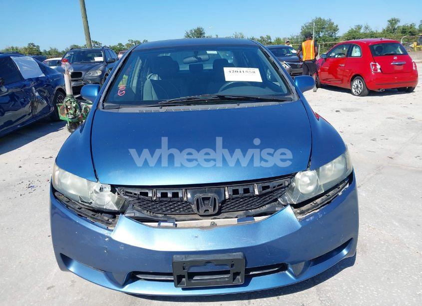 Photo 12 of 2011 Honda Civic LX (VIN 19XFA1F55BE028841)