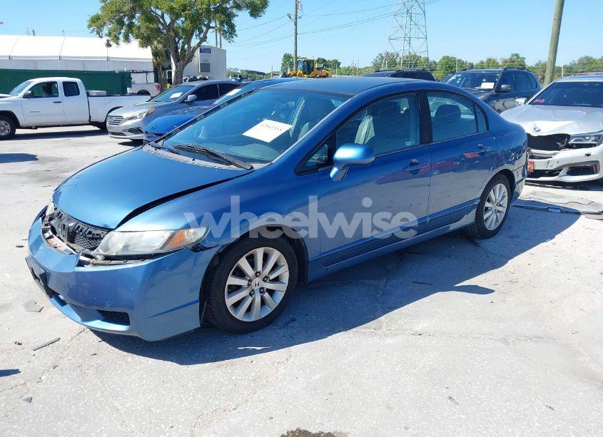 Photo 2 of 2011 Honda Civic LX (VIN 19XFA1F55BE028841)