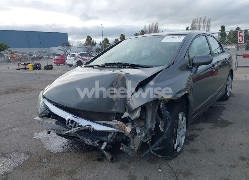 Photo 2 of 2011 Honda Civic LX (VIN 19XFA1F55BE048880)
