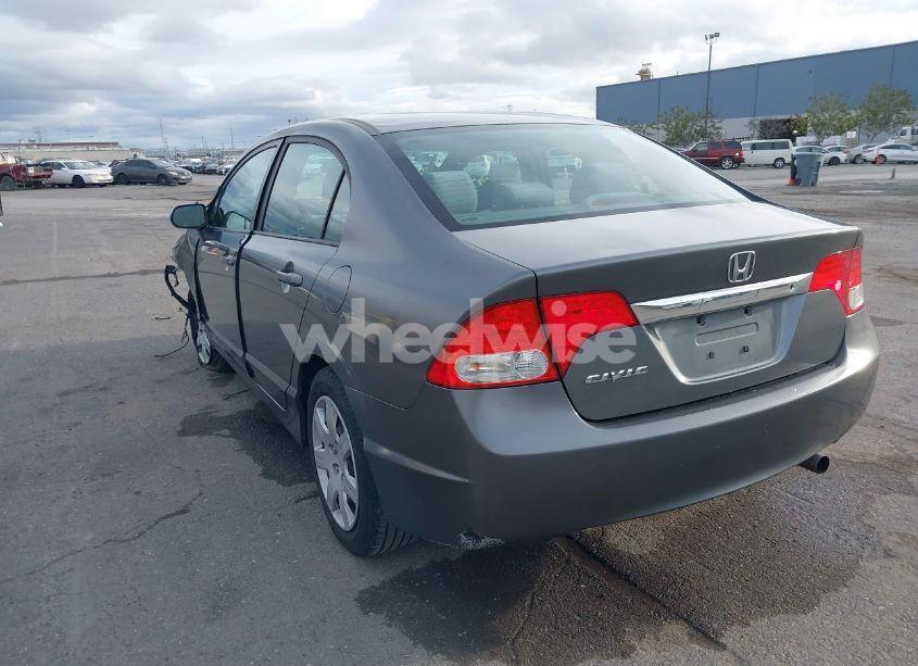 Photo 3 of 2011 Honda Civic LX (VIN 19XFA1F55BE048880)