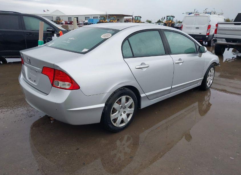 Photo 4 of 2010 Honda Civic LX (VIN 19XFA1F56AE075908)