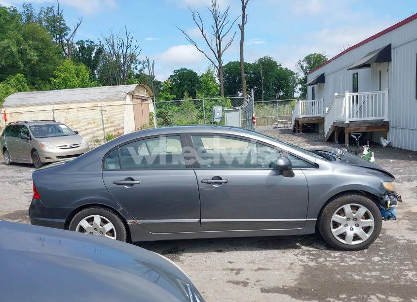 Photo 13 of 2011 Honda Civic LX (VIN 19XFA1F56BE024085)