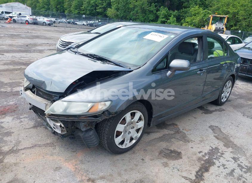 Photo 2 of 2011 Honda Civic LX (VIN 19XFA1F56BE024085)