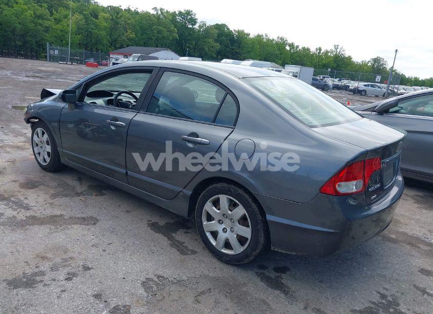 Photo 3 of 2011 Honda Civic LX (VIN 19XFA1F56BE024085)