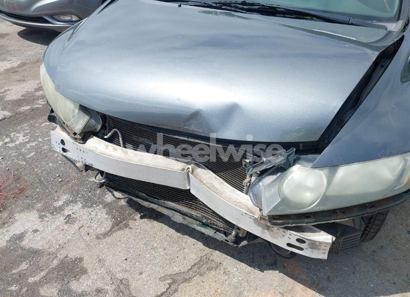 Photo 6 of 2011 Honda Civic LX (VIN 19XFA1F56BE024085)