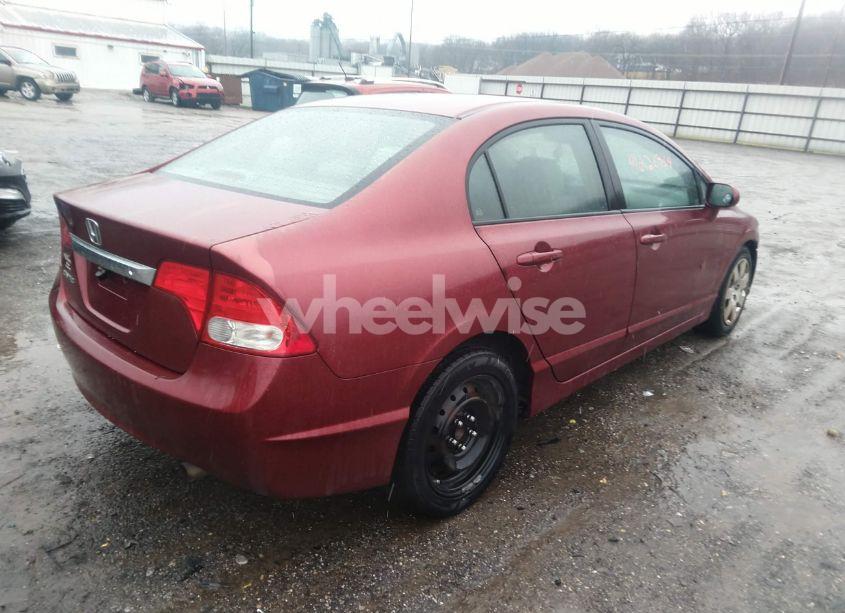 Photo 4 of 2011 Honda Civic LX (VIN 19XFA1F56BE027679)