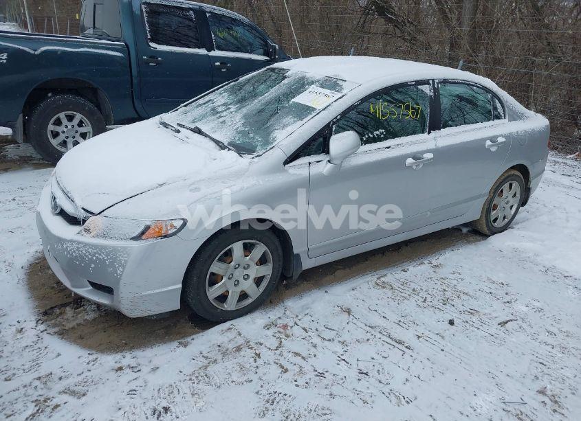 Photo 2 of 2011 Honda Civic LX (VIN 19XFA1F56BE032462)