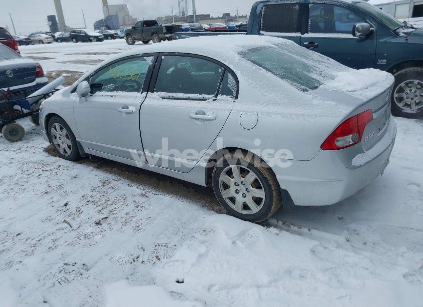 Photo 3 of 2011 Honda Civic LX (VIN 19XFA1F56BE032462)