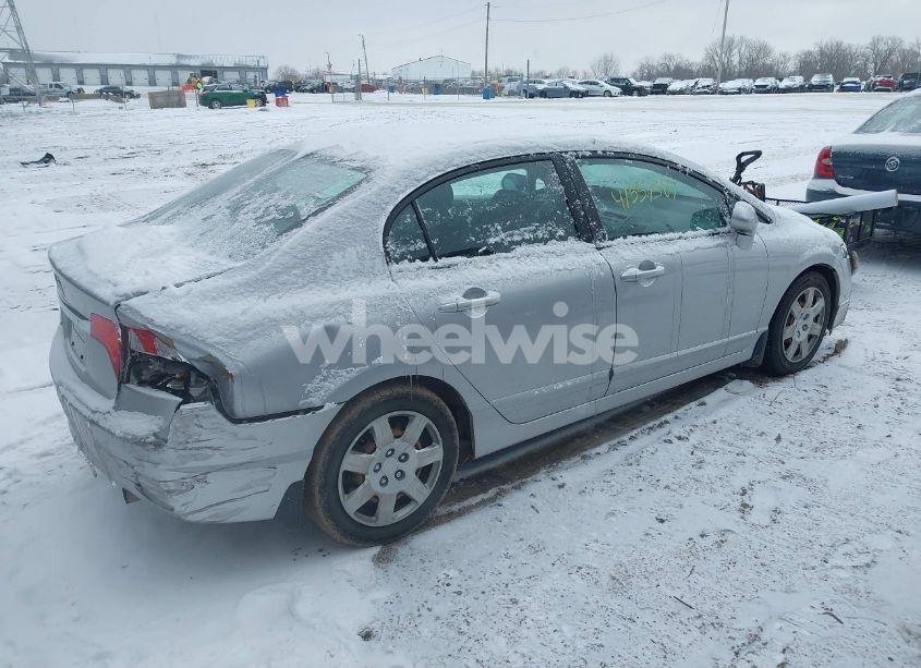 Photo 4 of 2011 Honda Civic LX (VIN 19XFA1F56BE032462)