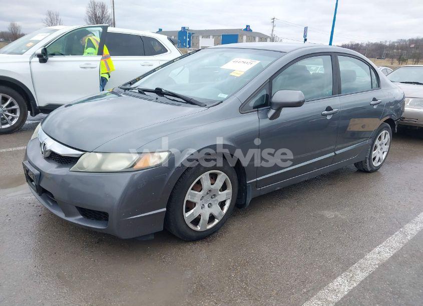 Photo 2 of 2010 Honda Civic LX (VIN 19XFA1F57AE011179)