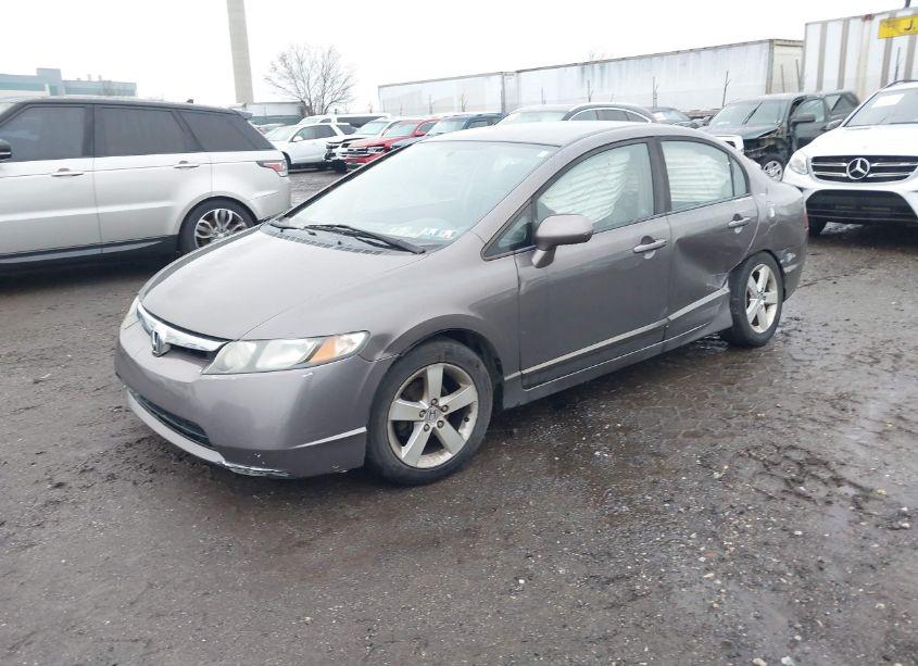 Photo 2 of 2010 Honda Civic LX (VIN 19XFA1F57AE071124)