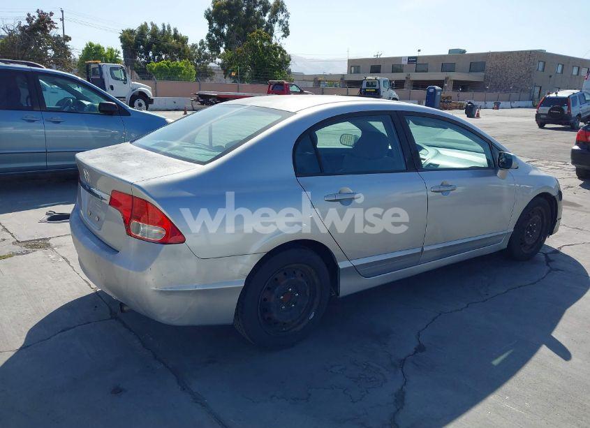 Photo 4 of 2010 Honda Civic LX (VIN 19XFA1F57AE077585)