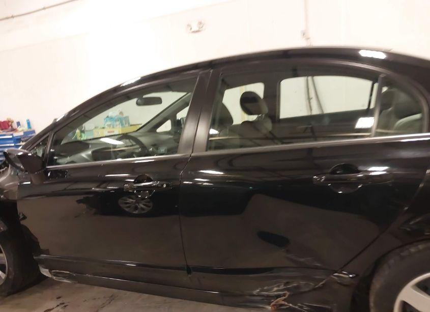 Photo 15 of 2011 Honda Civic LX (VIN 19XFA1F57BE028307)