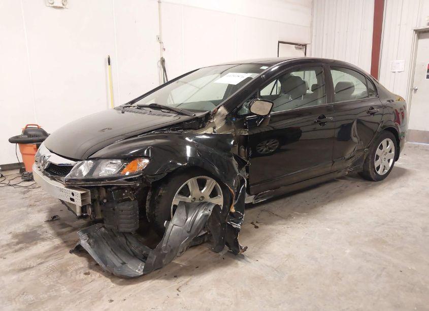 Photo 2 of 2011 Honda Civic LX (VIN 19XFA1F57BE028307)