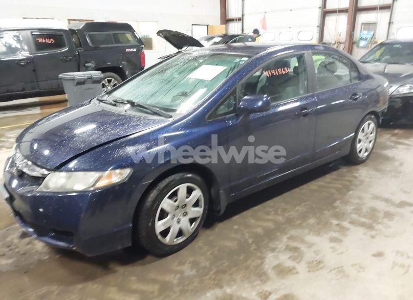 Photo 2 of 2011 Honda Civic LX (VIN 19XFA1F57BE029313)