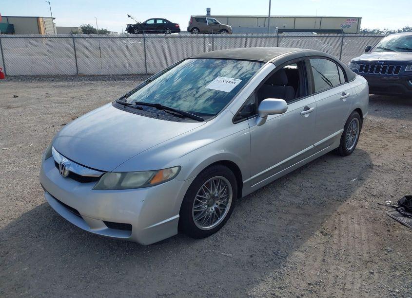 Photo 2 of 2011 Honda Civic LX (VIN 19XFA1F57BE029943)