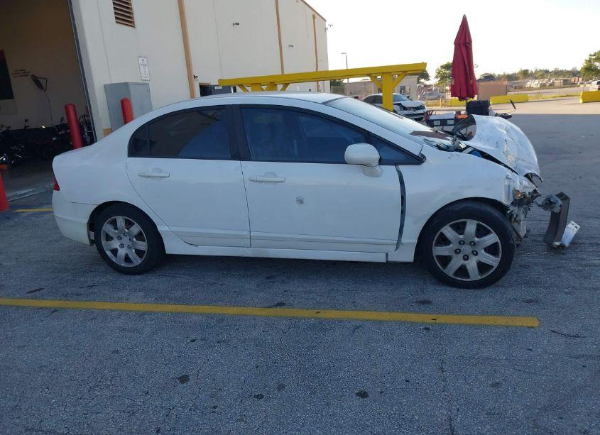 Photo 14 of 2011 Honda Civic LX (VIN 19XFA1F57BE031823)