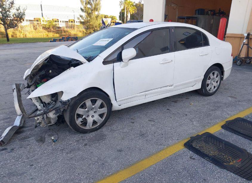 Photo 2 of 2011 Honda Civic LX (VIN 19XFA1F57BE031823)