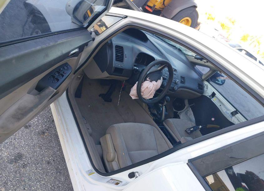 Photo 5 of 2011 Honda Civic LX (VIN 19XFA1F57BE031823)