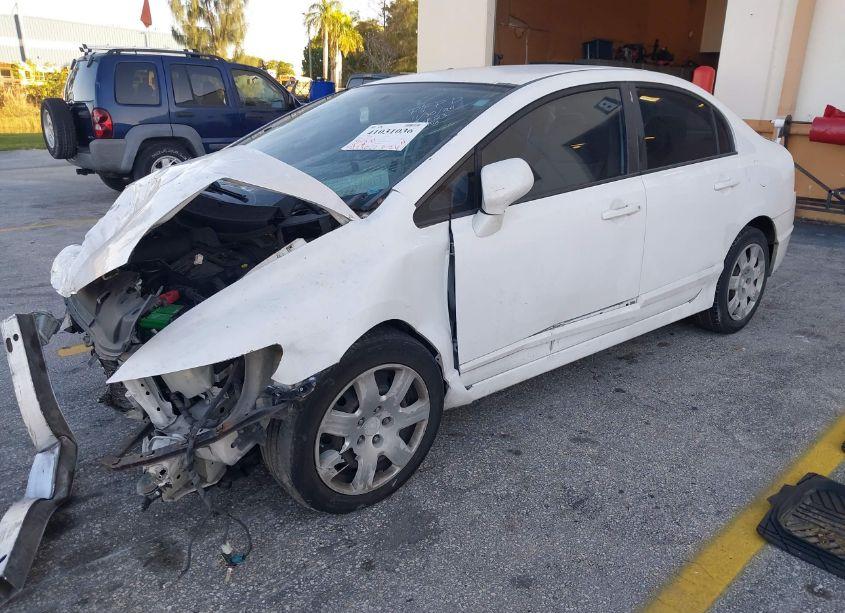 Photo 6 of 2011 Honda Civic LX (VIN 19XFA1F57BE031823)