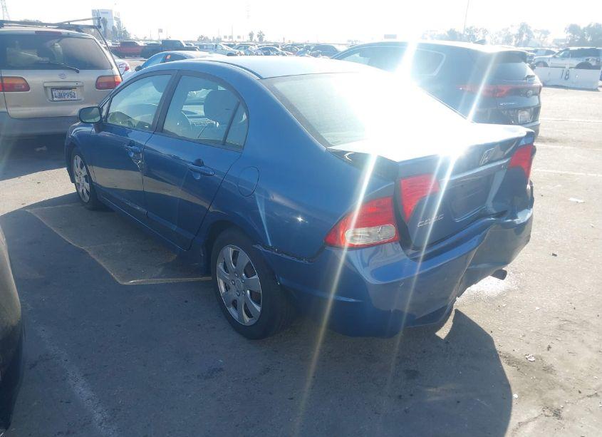 Photo 3 of 2011 Honda Civic LX (VIN 19XFA1F57BE032860)