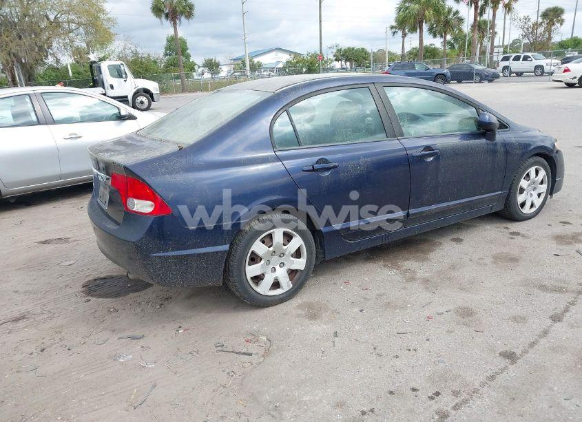 Photo 4 of 2011 Honda Civic LX (VIN 19XFA1F57BE033474)