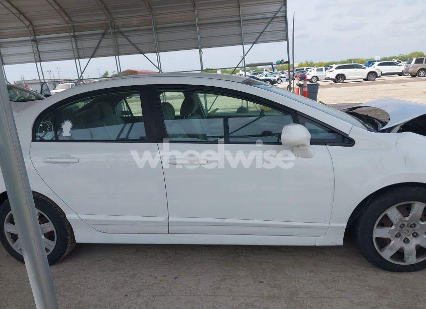 Photo 14 of 2011 Honda Civic LX (VIN 19XFA1F57BE040036)