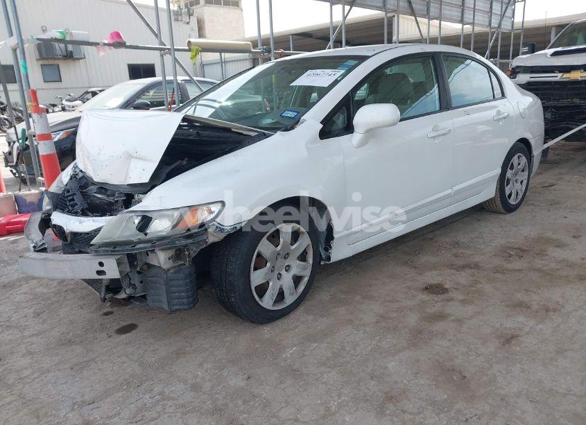 Photo 2 of 2011 Honda Civic LX (VIN 19XFA1F57BE040036)