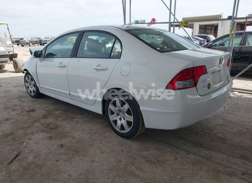 Photo 3 of 2011 Honda Civic LX (VIN 19XFA1F57BE040036)