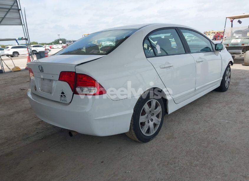 Photo 4 of 2011 Honda Civic LX (VIN 19XFA1F57BE040036)